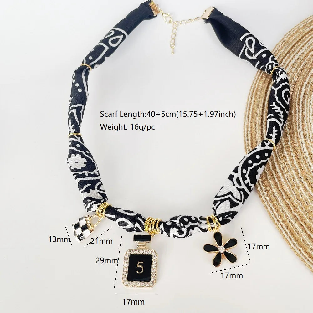 Orange Bandana Necklace with Gold Plated Charms – Sun, Dog, Heart & More – The Party Days | The Party Days