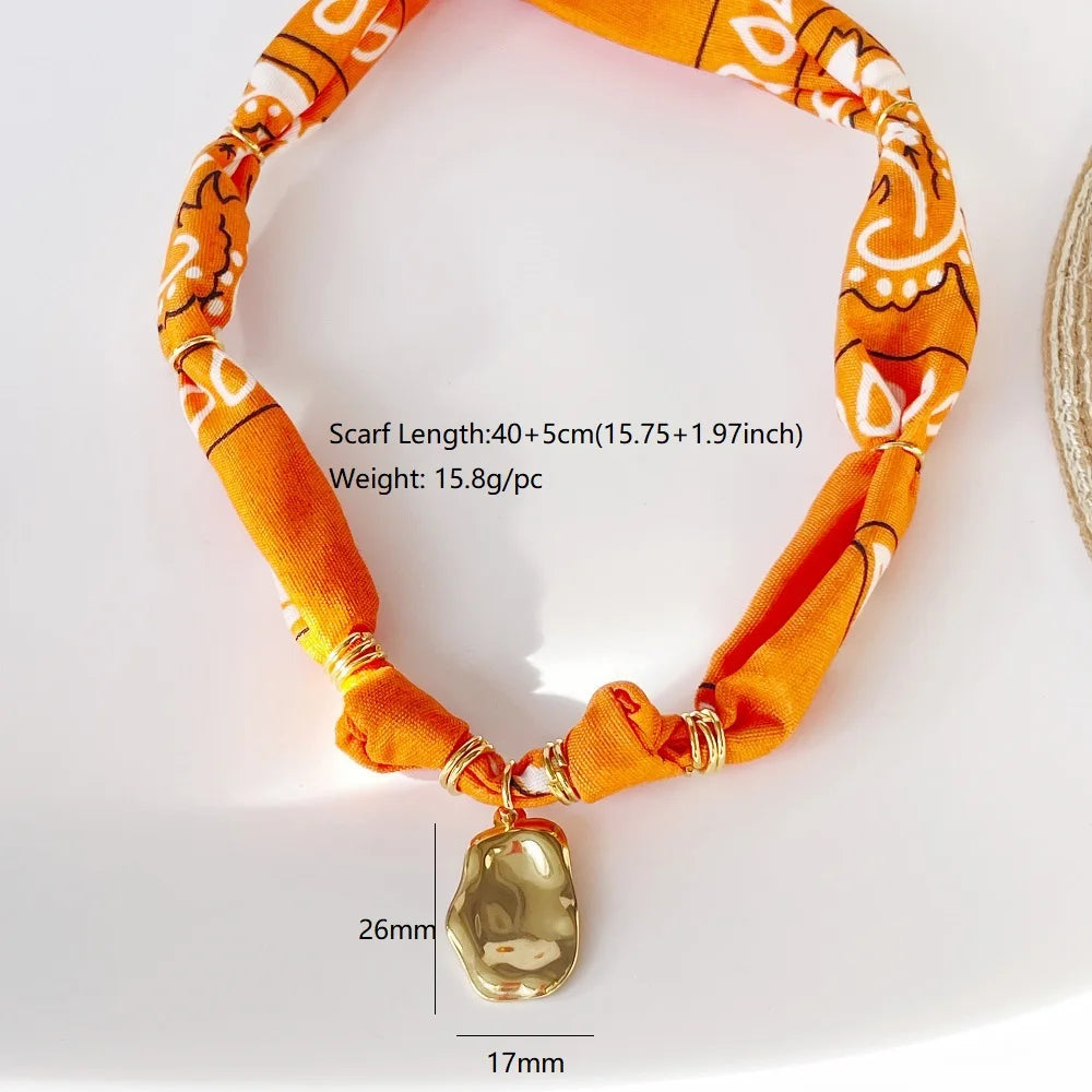Orange Bandana Necklace with Gold Plated Charms – Sun, Dog, Heart & More – The Party Days | The Party Days