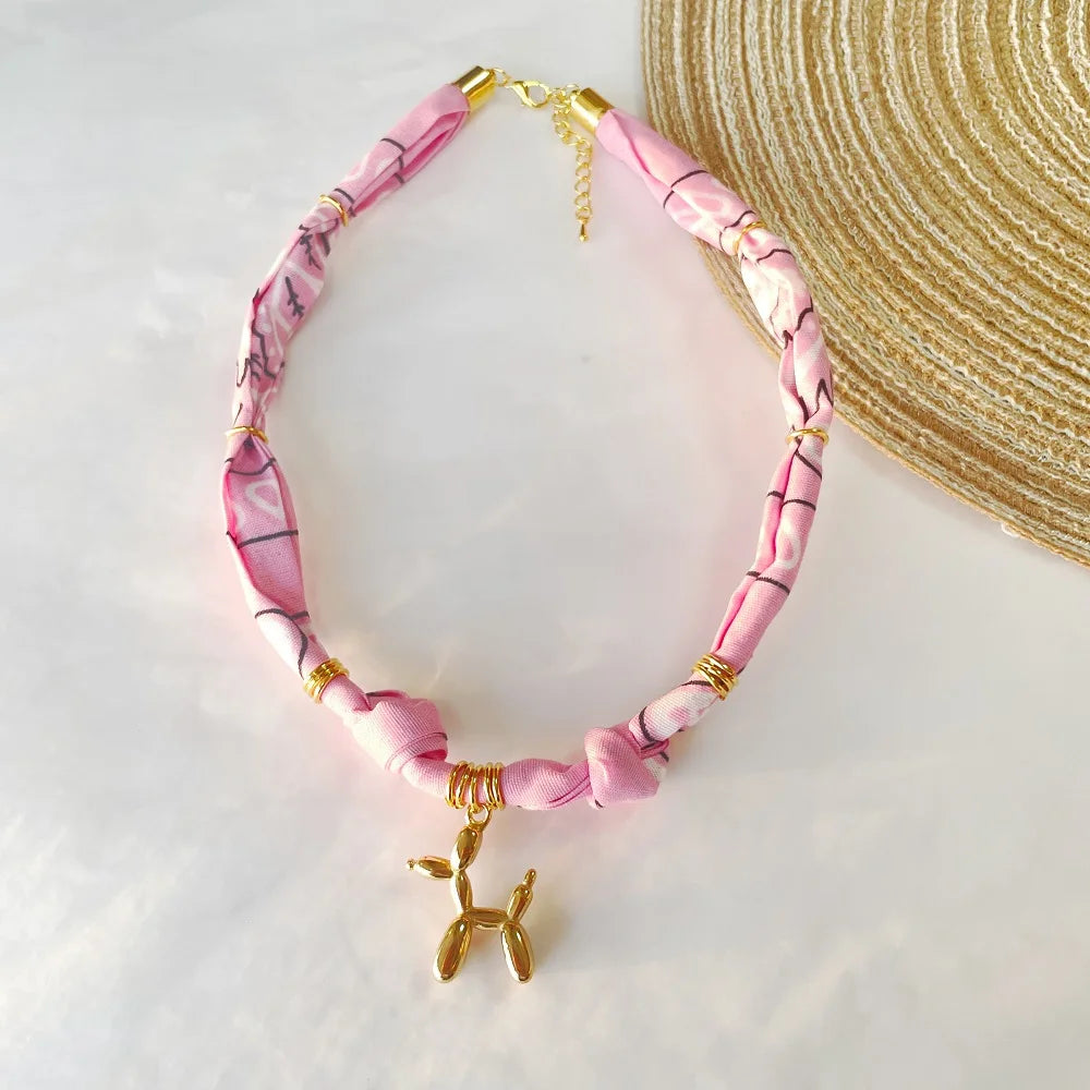 Orange Bandana Necklace with Gold Plated Charms – Sun, Dog, Heart & More – The Party Days | The Party Days