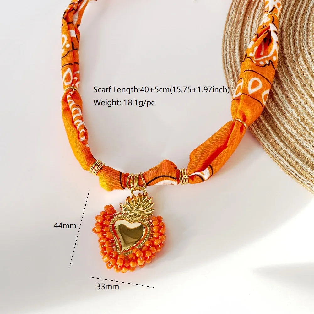 Orange Bandana Necklace with Gold Plated Charms – Sun, Dog, Heart & More – The Party Days | The Party Days