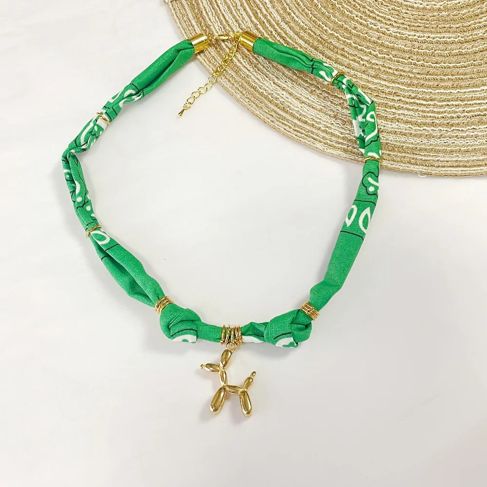 Orange Bandana Necklace with Gold Plated Charms – Sun, Dog, Heart & More – The Party Days | The Party Days