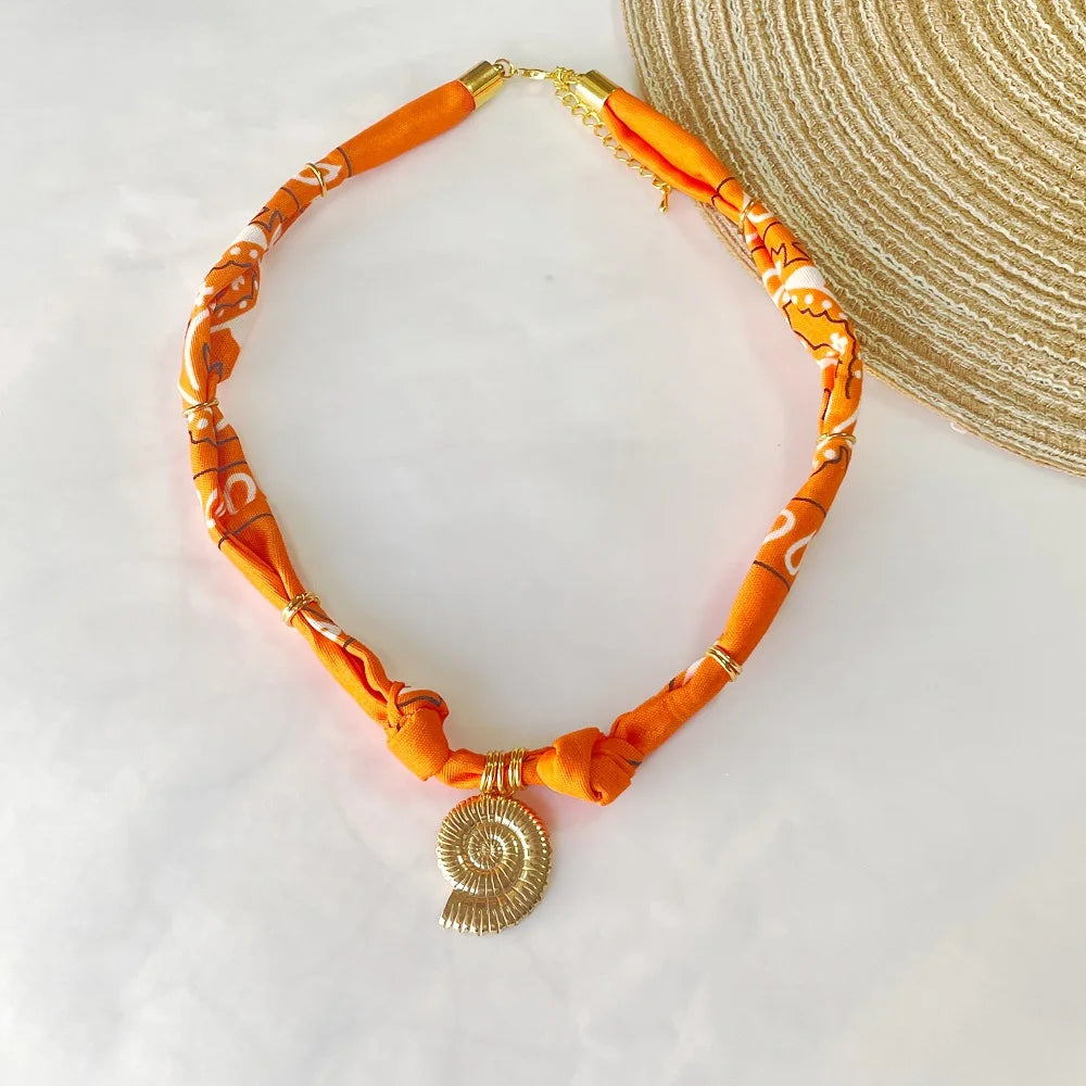 Orange Bandana Necklace with Gold Plated Charms – Sun, Dog, Heart & More – The Party Days | The Party Days