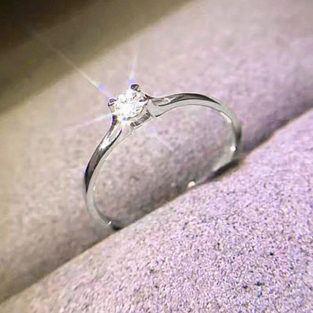 Minimalist Women's Wedding Ring with 4MM Cubic Zirconia – Elegant Engagement Band | The Party Days | The Party Days