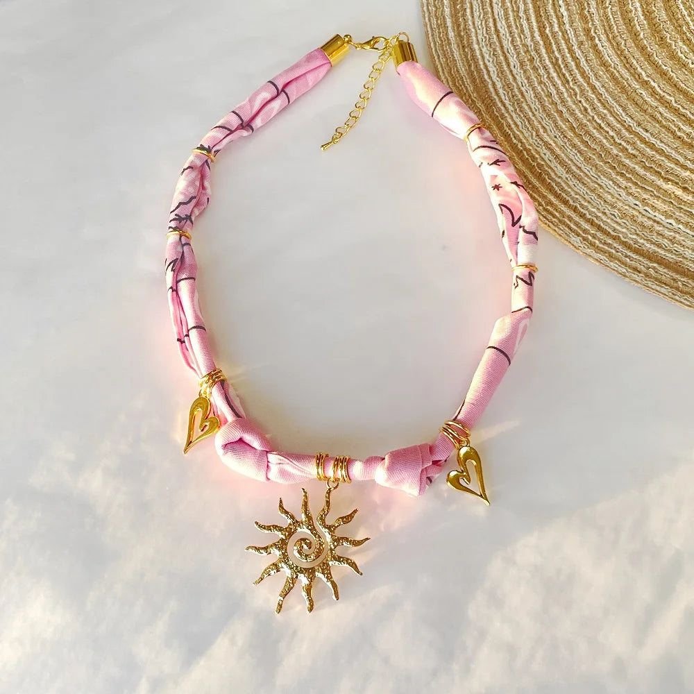 Orange Bandana Necklace with Gold Plated Charms – Sun, Dog, Heart & More – The Party Days | The Party Days