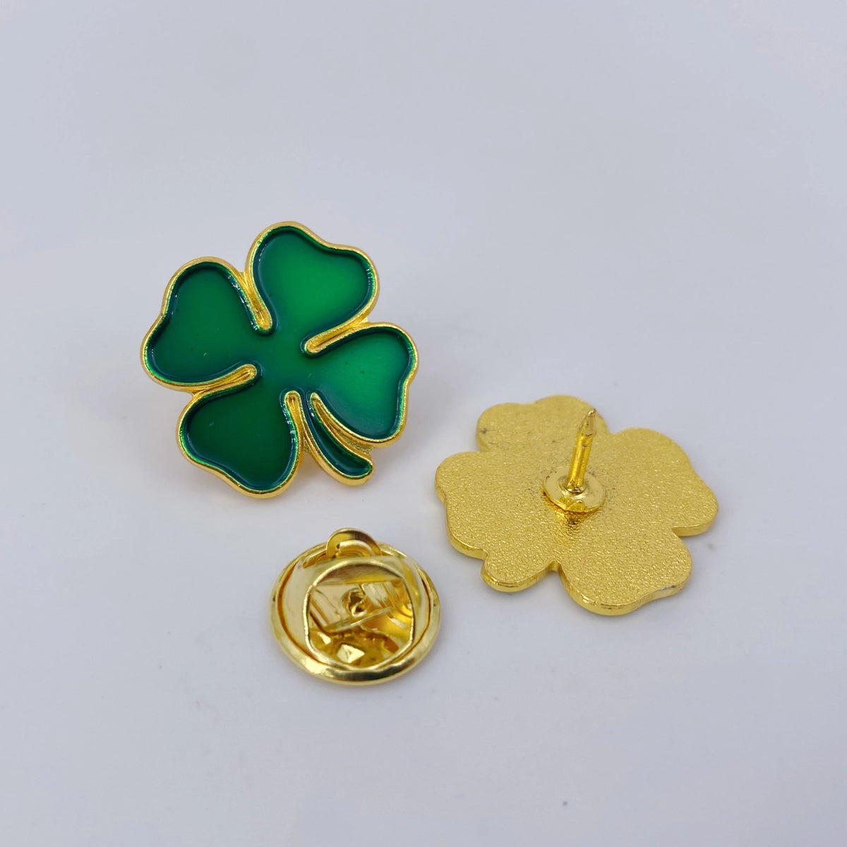St. Patrick's Day Four-Leaf Clover Pin – Green & Gold Metal Brooch – The Party Days | The Party Days